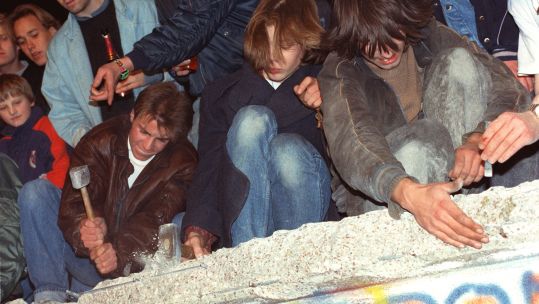 West Berlin's citizens try to pull down the Berlin Wall