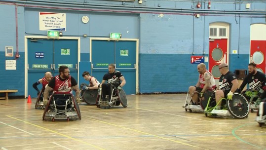 Team UK's wheelchair rugby side against Welsh outfit, RGC.