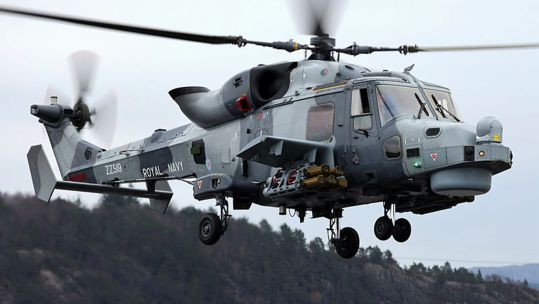 A Royal Navy wildcat helicopter trains on Exercise Amber Shield