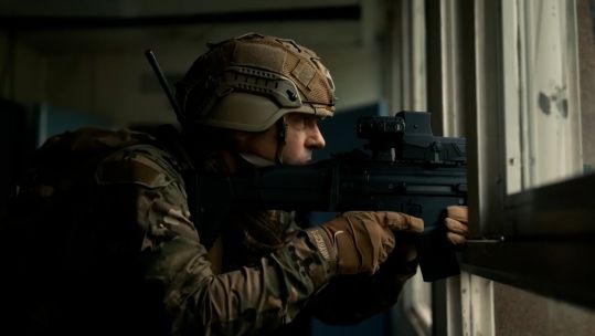 XTRAIM Weapon Sight, soldier using it out of window