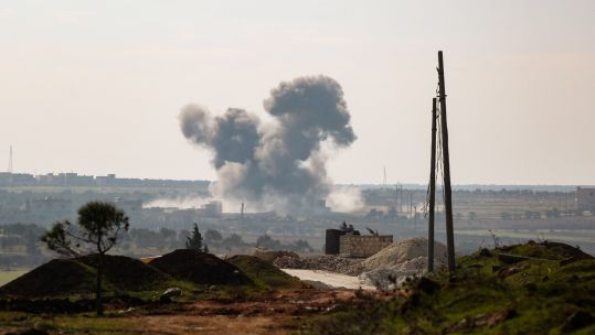 An air strike, allegedly carried out by Russian and Syrian forces in Sarmin, Idlib province (Picture: PA).