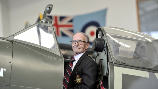 John Llewellyn on Spitfire plane - CREDIT SWNS