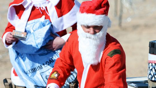 Santa Claus Delivering Christmas Parcels to Troops . Credit MOD/Crown Copyright