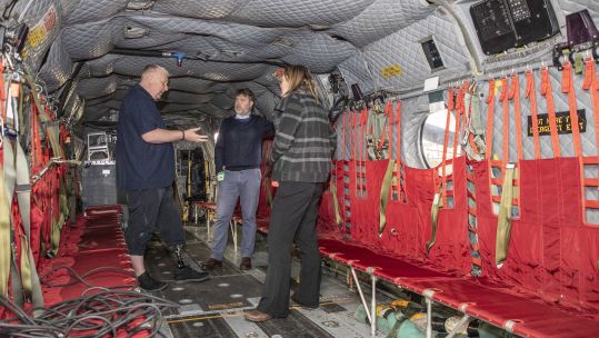 Mick McConnell with some of the Chinook crew members that saved his life