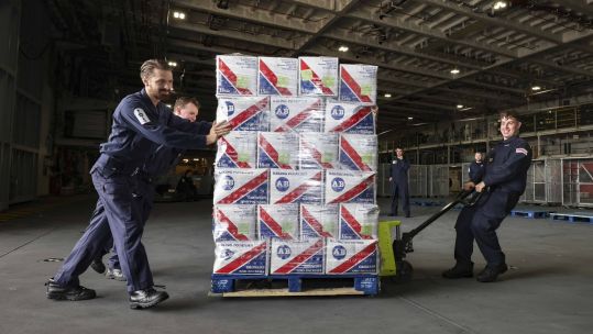 HMS Queen Elizabeth embarking stores before deploying in September 2023 2 CREDIT Royal Navy
