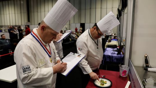 Judges at Exercise Joint Caterer inspect food credit BFBS fine to reuse.