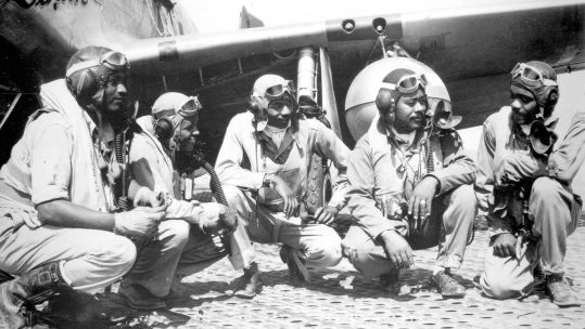 L to R Tuskegee Airmen. 332nd Fighter Group pilots Lt Dempsey W Morgran, Lt Carroll S Woods, Lt Robert H Nelson Jr, Capt Andrew D Turner and Lt Clarence P Lester pictured in Ramitelli Italy CREDIT US Air Force