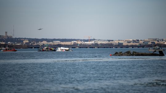partially submerged black hawk helicopter in river CREDIT US Coast Guard .jpg