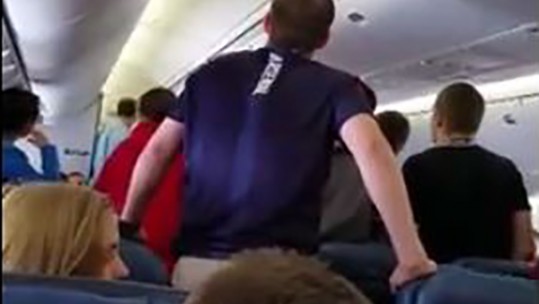 Choir On Plane Sings Tribute To Fallen Soldier