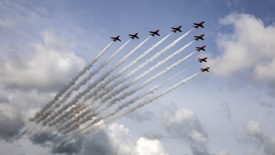 Cover image:  The Red Arrows display team (Picture: RAF/MOD).