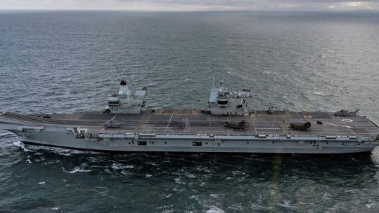 The Royal Navy's flagship HMS Queen Elizabeth has had eleven kilograms of marine life cleaned off her propeller - improving her performance (Picture: Royal Navy)