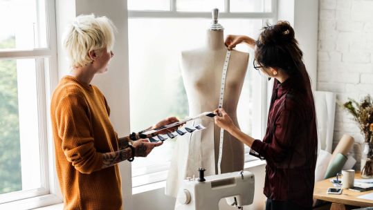 Fashion Designer Using A Measuring Tape On A Mannequin Image by rawpixel.com