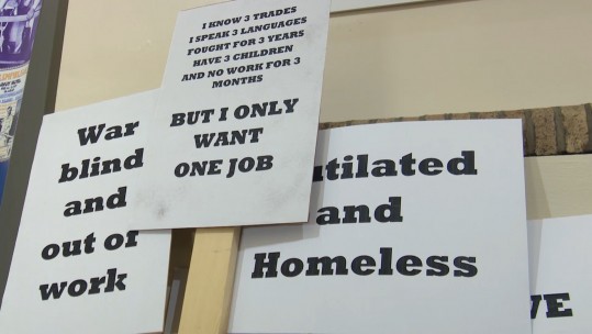 Replica signs have been made, reflecting how soldiers felt after World War I.
