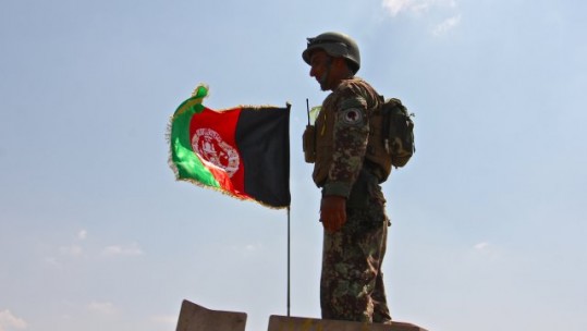PICTURES: US ARMY // An Afghan National Army soldier from 201 Corps stands in the gunner's turret of an armored vehicle 
