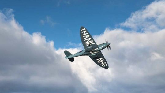 A photo-reconnaissance blue Spitfire PL983 ‘L’, which toured the country last year in tribute to the NHS.Credit Aircraft Restoration Company