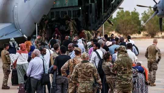 The evacuation of British Nationals onto an RAF aircraft at Wadi Seidna Air Base in Sudan