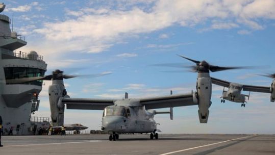 two USMC MV-22B Ospreys onboard HMS Queen Elizabeth to disembark USMC personnel Exercise Strike Warrior