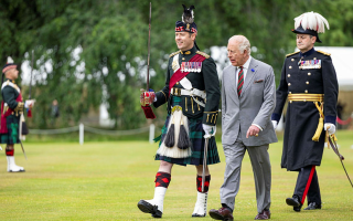  His Majesty The King accompanied by Major Tommy Blair and Governor of Edinburgh Castle, Major General Bob Bruce CBE DSO at the Ceremony of the Keys
