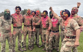 Personnel at the Royal Military Academy Sandhurst threw Rang, a coloured powder, at one another as part of the annual Holla Mohalla festival