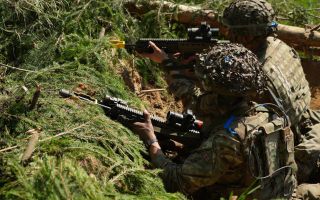 Scots in the trenches they prepared during Exercise Spring Storm in Estonia