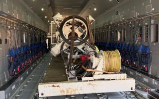 Part of the Nato Submarine Rescue System was loaded onto a simulator with the exact dimensions and deck arrangement of an RAF A400M Atlas (Picture: UK Gov)