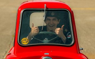 One of the minehunter's crew inside the tiny car in Douglas (Picture: HMS Middleton X)