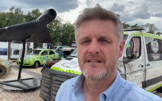  Simon Newton in front of Russian Shahed drone in Ukraine (Picture: BFBS)