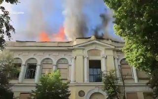 The building, which had already survived the Great Patriotic War, was badly damaged by the missile, with workers scrambling to save the artworks inside (Picture: Emergency services of Ukraine)