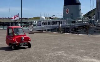 HMS Middleton crew member driving P500 microcar in Isle of Man cred HMS Middleton X