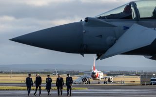Prime Minister Sir Keir Starmer and Norwegian counterpart Jonas Gahr Støre visit RAF Lossiemouth, accompanied by Station Commander Group Captain Sarah Brewin CREDIT MOD04122025 Prime Minister Sir Keir Starmer and Norwegian counterpart Jonas Gahr Støre visit RAF Lossiemouth, accompanied by Station Commander Group Captain Sarah Brewin