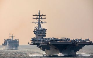 The USS Dwight D Eisenhower along with its strike group conducted a patrol through the Strait of Hormuz in 2024