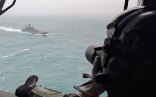 The crew of the 815 Naval Air Squadron Wildcat managed to take a few snaps of the Russian visitors