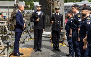 The Prince of Wales visited Faslane to mark 125 years of the Royal Navy's Submarine Service