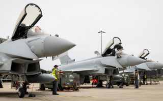 RAF Typhoons prepare to take off from RAF Coningsby to head to Qatar to support the defence of British interests and regional allies in the region 
