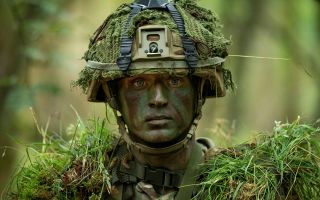 Private Bishop from 1st Battalion The Royal Anglian Regiment wears full camouflage and Tactical Engagement Simulation kit during Exercise Viking Strike on Otterburn training area in Northumberland (Picture: MOD)