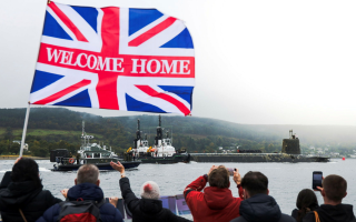 Family members welcome home their loved ones