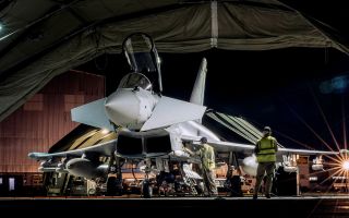 A Typhoon FGR Mk4 gets prepared to carry out defensive counter-air sortie operations across the Middle East