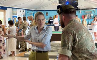 Former Intelligence Corps officer Louise Sandher-Jones chatted to numerous couples during hr visit