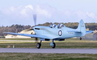 The Spitfire takes off from RAF Lossiemouth en route to Prestwick on the fourth leg of its nine-flight round trip of Britain