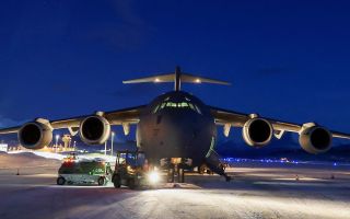 An RAF C-17A Globemaster carrying Wildcat helicopters arrives in Norway as part of the Commando Helicopter Force for its annual workout in the Arctic Circle, Operation Clockwork