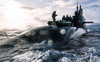 Royal Marines hitch a ride on German Submarine during Exercise Cold Response