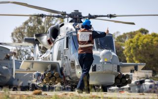 A Royal Navy Wildcat lifts off for a sortie from RAF Akrotiri where the helicopters, armed with Martlet missiles, are providing a defensive screen against drone attack