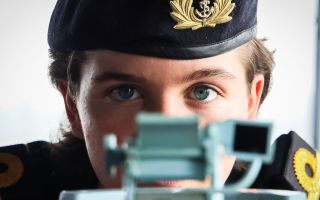 Sub-Lieutenant King takes a reading on board HMS Prince of Wales as she sails from Goa in India on Operation Highmast with Carrier Strike Group 25
