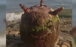 Big sea mine on shore of black sea