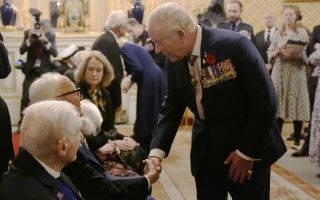 King Charles at reception for veterans who served in Pacific during WW2, part of the commemorations marking 80th anniversary of VJ Day, at Windsor Castle, Berkshire 