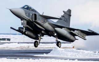 A Swedish air force Gripen takes off during its deployment on Nato's air policing mission in Iceland (Picture: MOD)