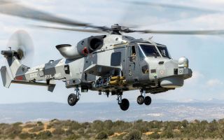 A Wildcat HMA2 from 815 Squadron, armed with Martlet missiles, takes off for a sortie in Cyprus