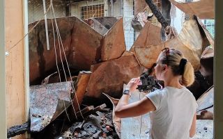 BFBS Forces News reporter Hannah King photographs the aftermath of a twin Russian strike in Kharkiv which claimed several lives (Picture: BFBS)