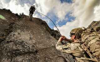 Royal Marines abseil down Foggintor Quarry on Dartmoor as part of a training exercise with South Korean forces (Picture: MOD)