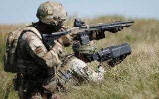 These soldiers from 1 Rifles are testing the Mossberg 590M counter-UAS shotgun and a handheld effector, but Project Panoptes is looking for an autonomous system (Picture: MOD)